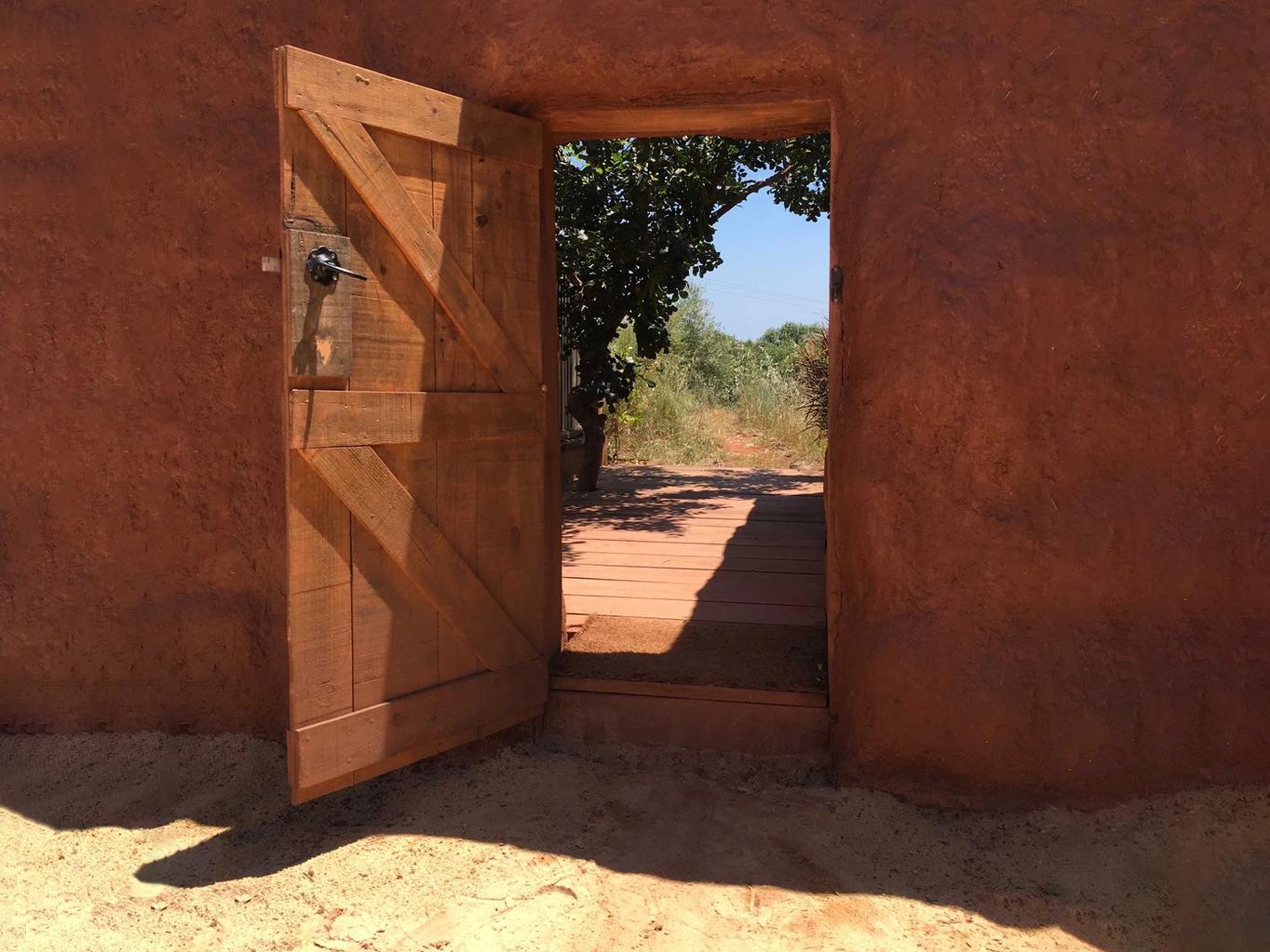 A doorway within Phaedra at The Beekeepers